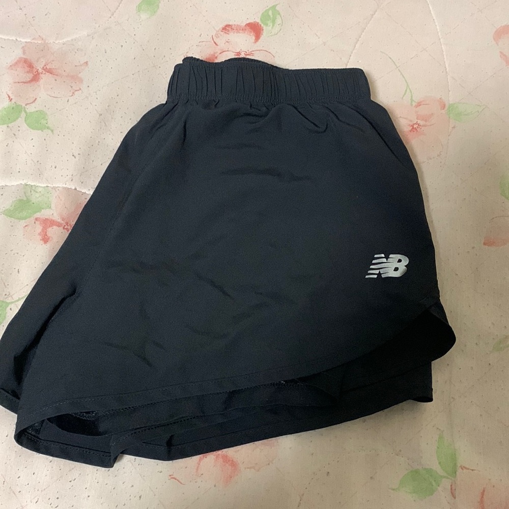 Size medium black New Balance shorts